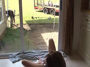 Wild housewife milks while watching gardener working
